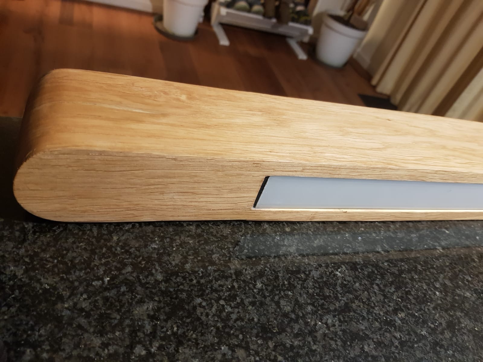 Michael's photograph of a rounded timber edge and recessed light